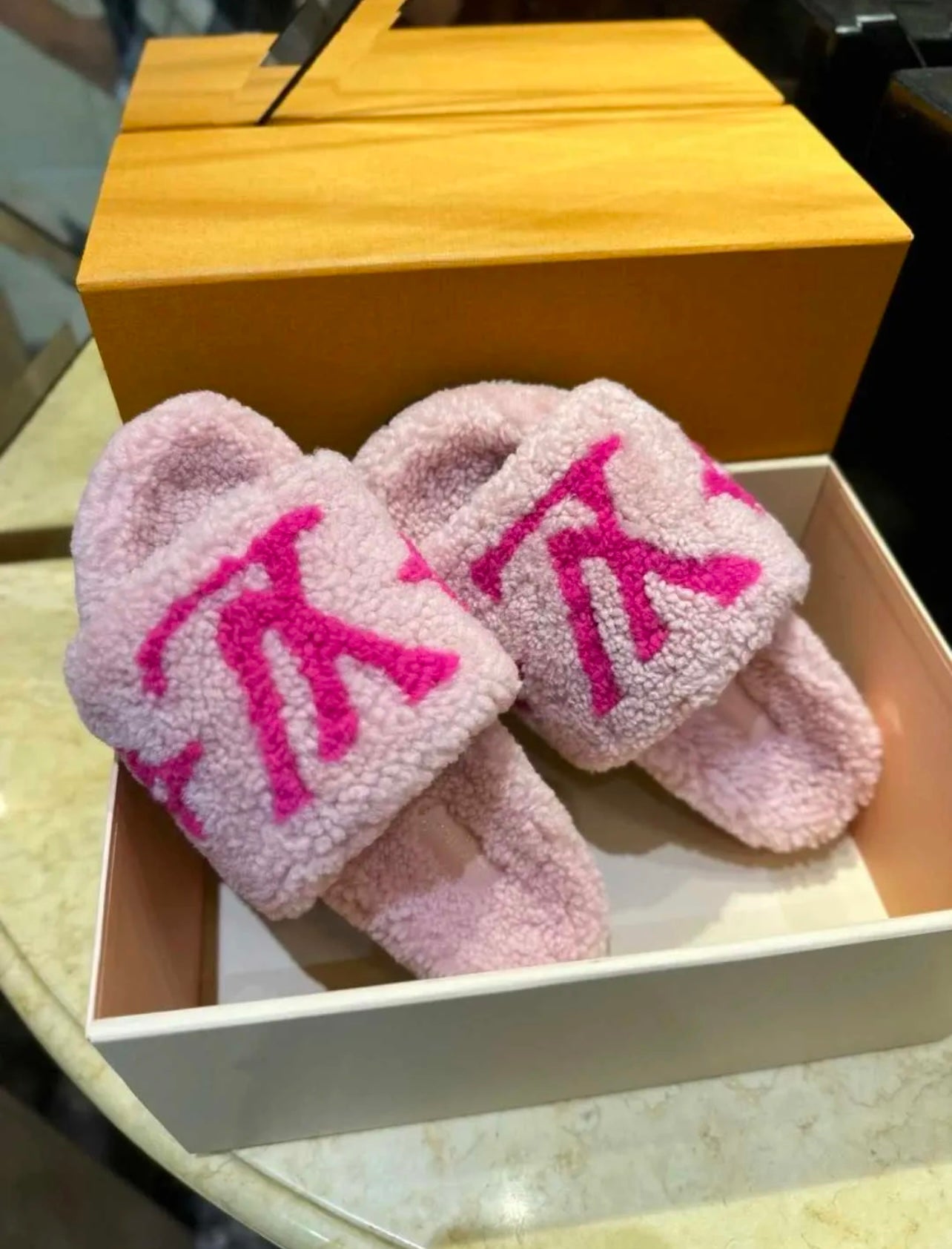 LV fur sandals